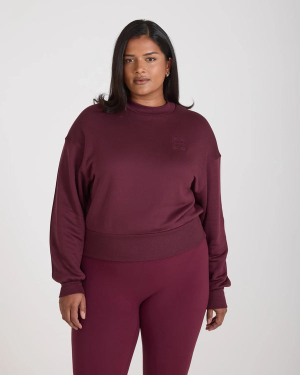 Fig sweatshirt with debossing in buttery-soft lyocell fleece, featuring a relaxed fit and drop shoulder design.