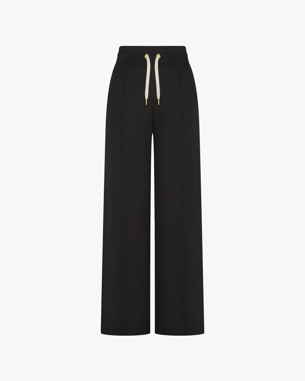 Refined black lyocell trousers with wide-leg fit and pin-tuck detailing.