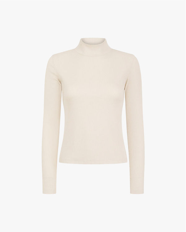 Beige turtleneck sweater on a white background