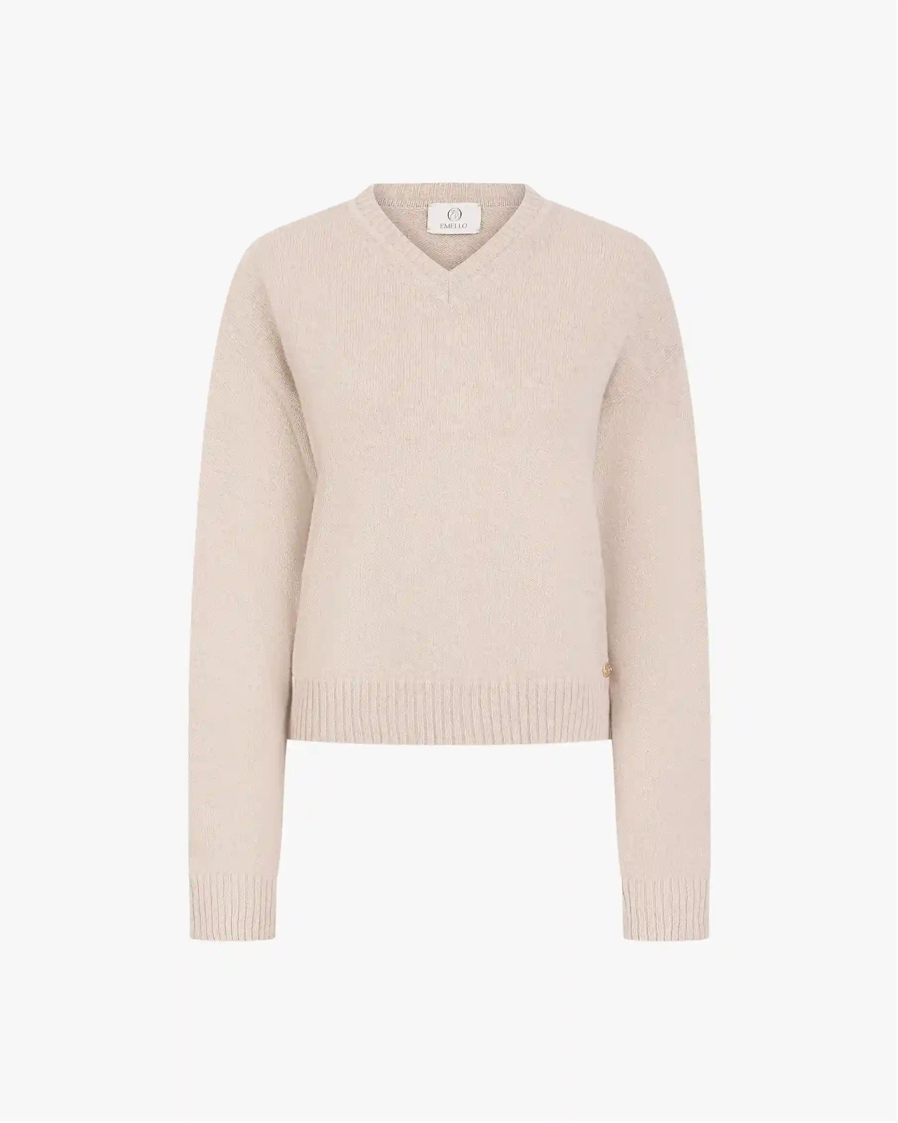 Beige sweater on a white background