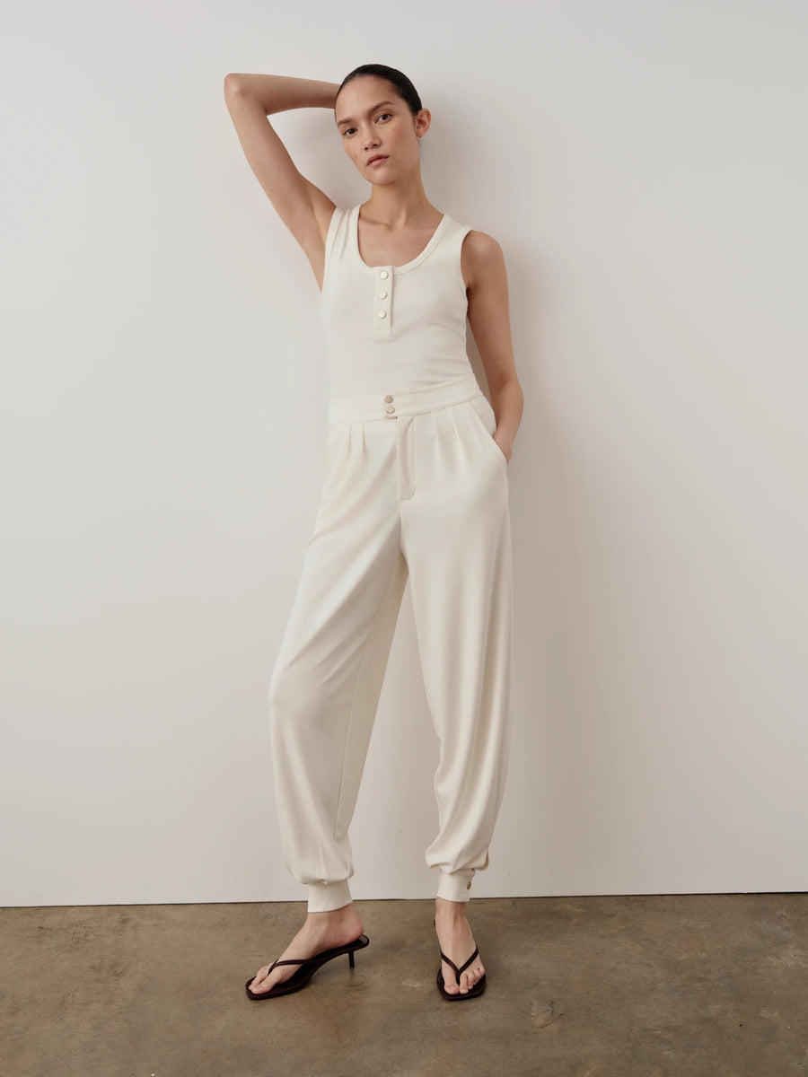 Emello Balloon Popper Trousers in cream, featuring a fluid balloon silhouette with adjustable hems.