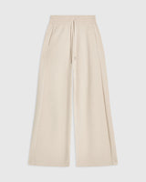 Emello Bouclé Wide Leg Trousers in Cream, showcasing a flowy silhouette and ribbed waistband.