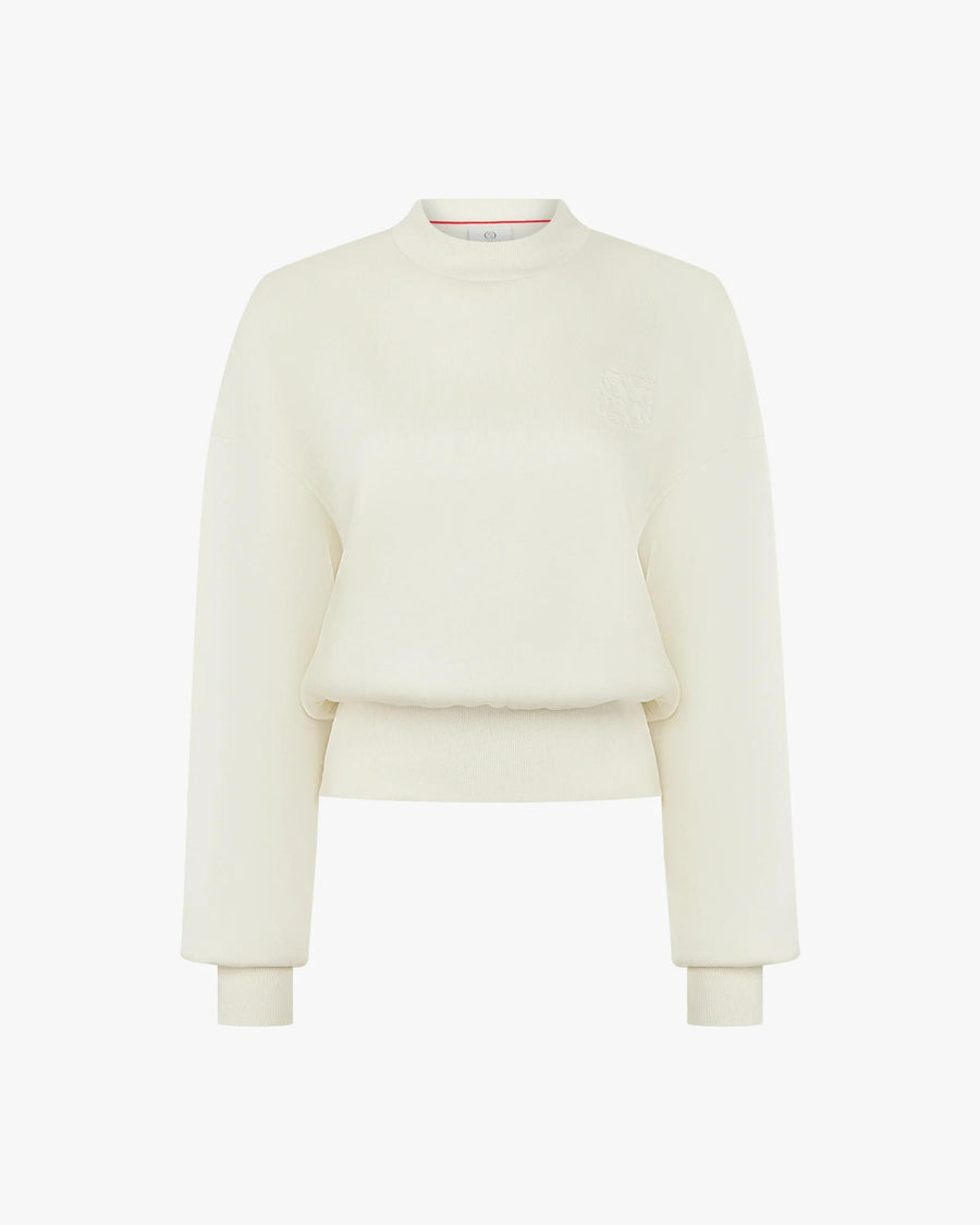 Elegant cream sweatshirt with debossing crafted from buttery-soft lyocell fleece, featuring a relaxed fit and refined details.