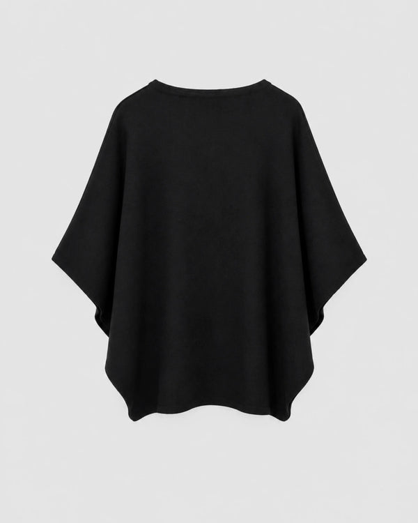Reversible Jacquard Cape in extrafine merino wool, showcasing a plain-knit finish.