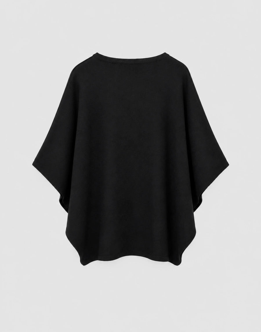 Reversible Jacquard Cape in extrafine merino wool, showcasing a plain-knit finish.