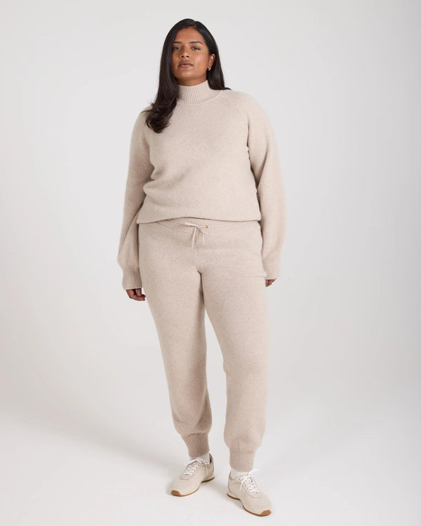 Kasima Cashmere Blend Knit Trousers in Beige with Ribbed Cuffs and Gold Accents