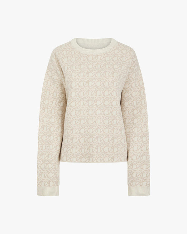 Cream reversible jacquard cashmere sweater in a cashmere blend