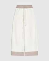 Emello Contrast Hem Wide Leg Trousers in White Combed Cotton with Viscose Panels.