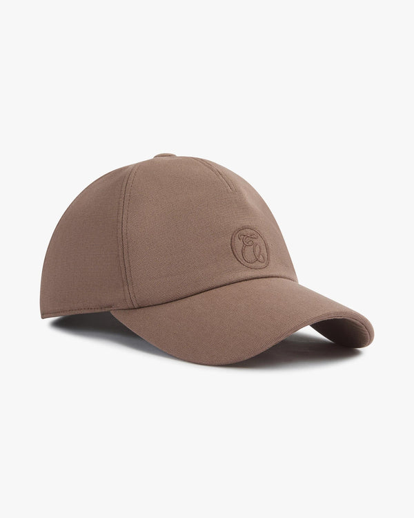 Taupe cotton canvas cap with embroidery, shaped peak and elasticated back.