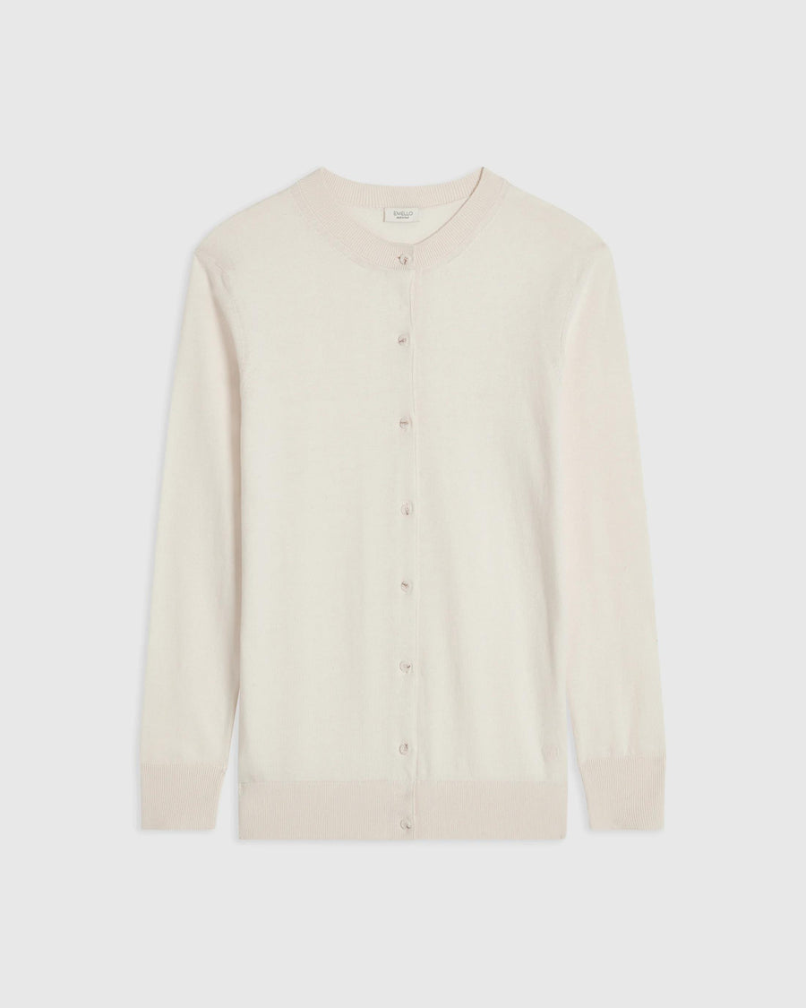 Elegant cream cotton-cashmere cardigan, showcasing refined simplicity and fine craftsmanship.