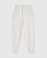 Emello Cotton Cashmere Knit Trousers in modern cream offering relaxed drape and tactile elegance.