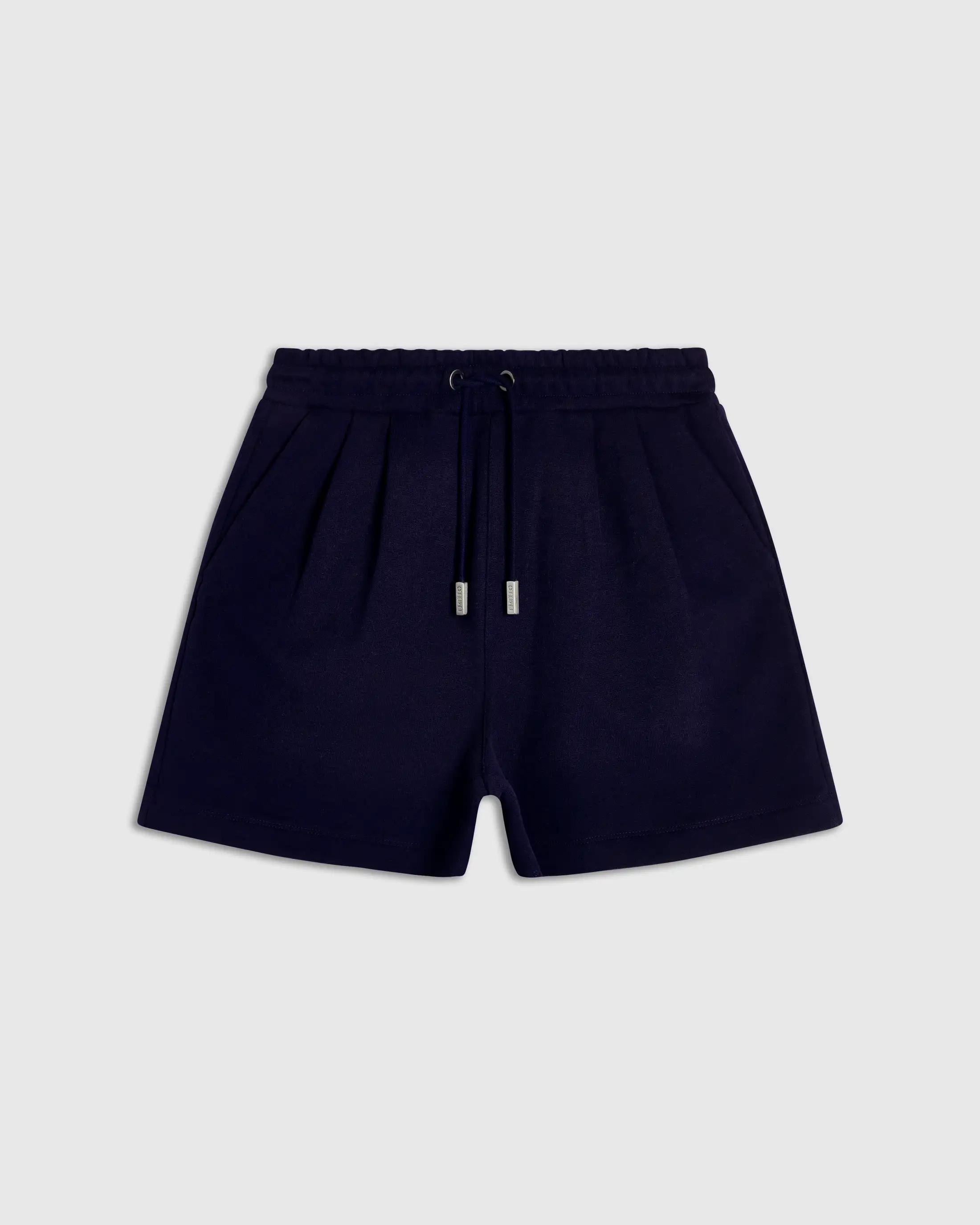 Embroidered Pocket Shorts in Navy with a relaxed, boxy fit by Emello.