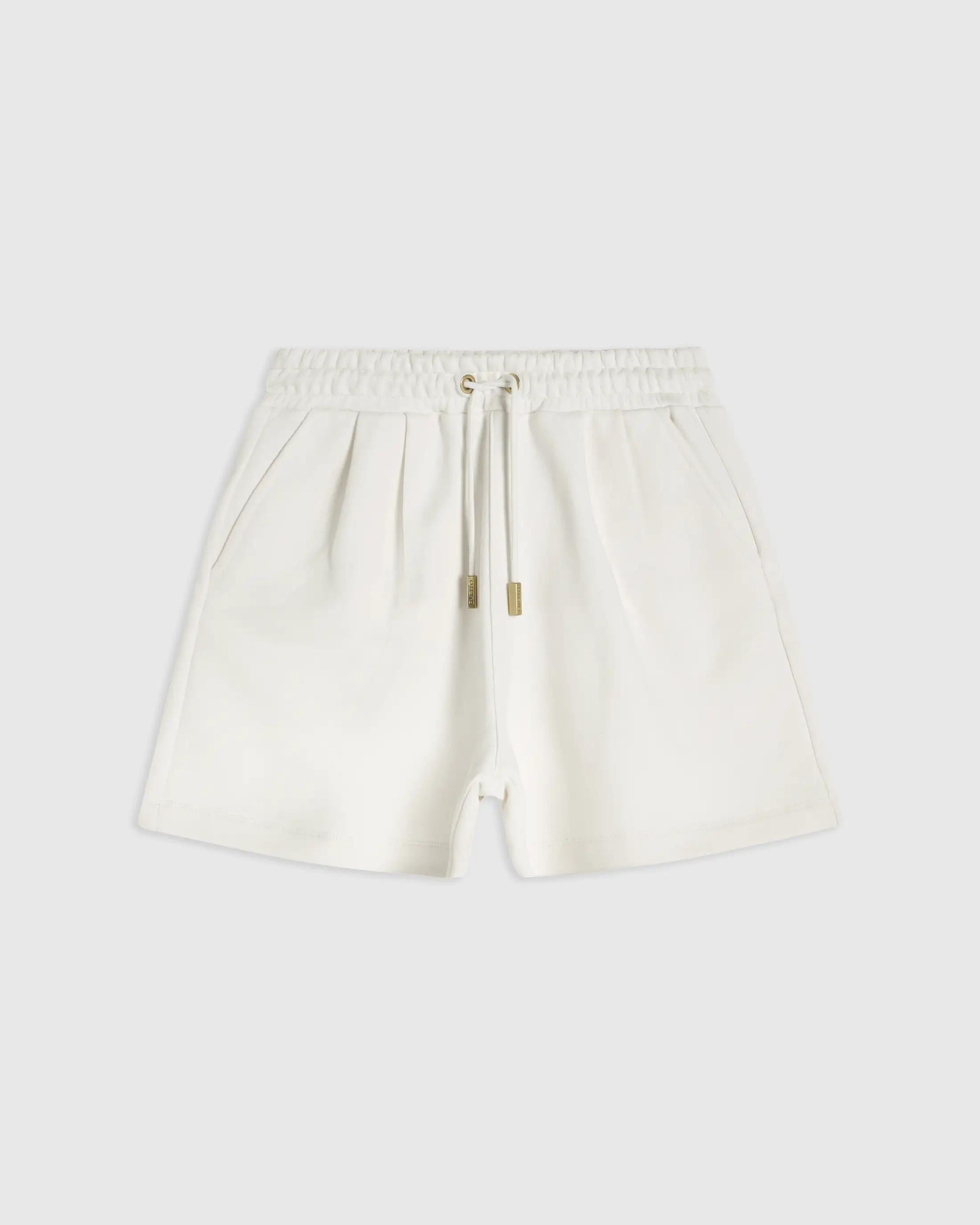Embroidered Pocket Cotton Shorts in Cream with a relaxed fit and tonal embroidery.