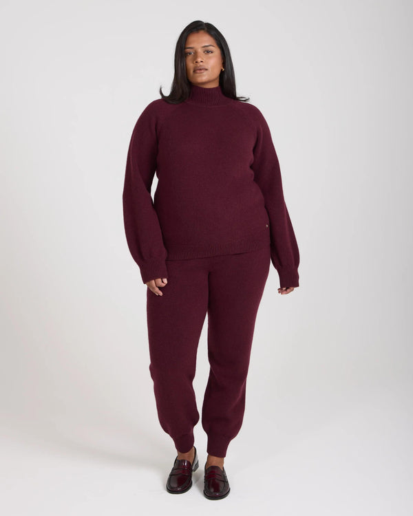 Kasima Cashmere Blend Knit Sweater in Burgundy Fig, featuring a relaxed fit and elegant folded rib funnel neck.