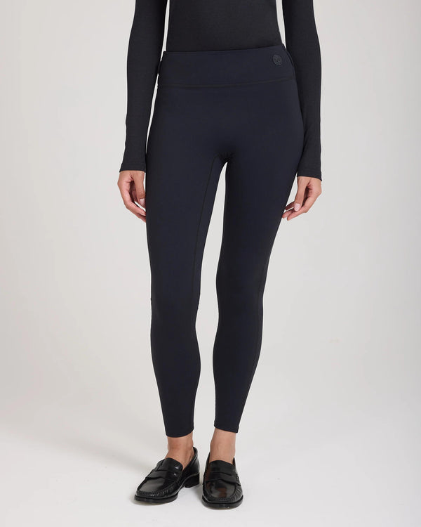 Model wearing Emello Forma Super Soft Sculpting Leggings in black with belt loops