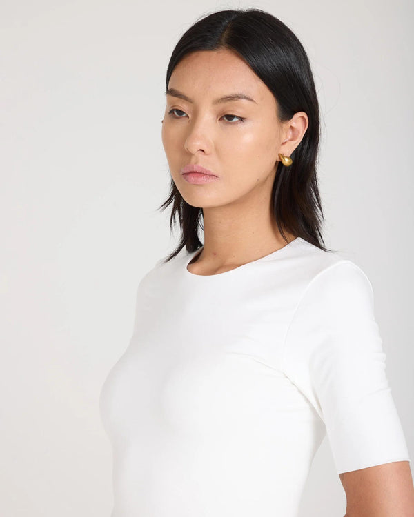 Cream double-layer lyocell jersey top with a crew neck and short sleeves.