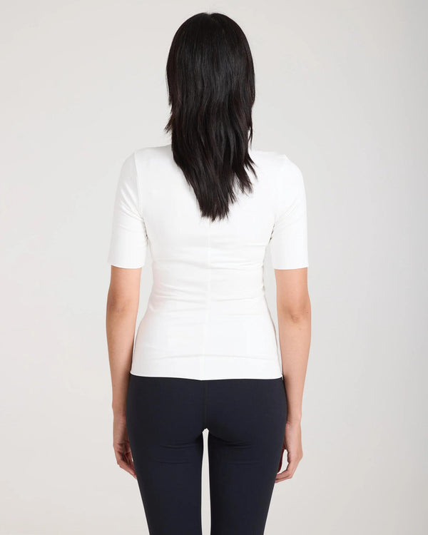 Back view of the Forma Silky Lyocell Jersey Double-Layer Top in Cream, showcasing seamless design and luxury craftsmanship.
