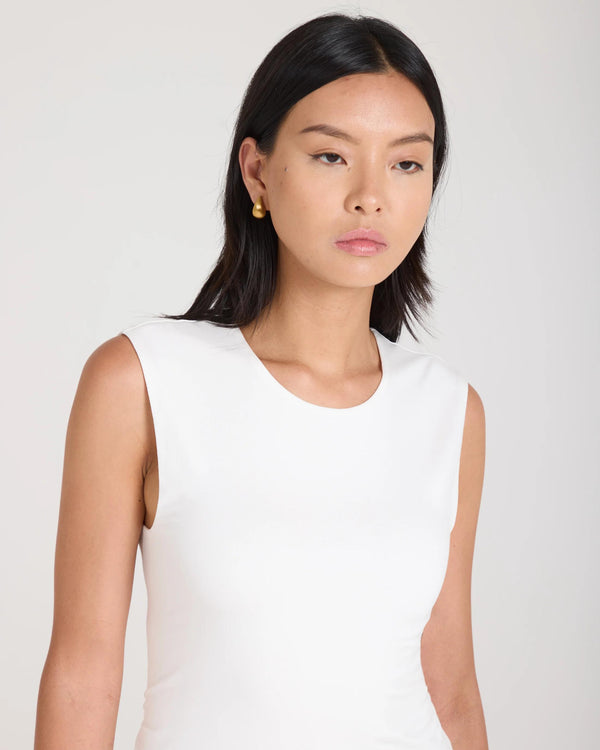 Model wearing the Emello Forma Silky Lyocell Jersey Double-Layer Vest in cream