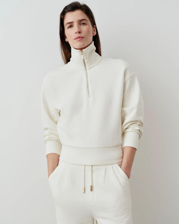 Cream Funnel-Neck Sweatshirt with Half-Zip and Blouson Sleeves, styled with matching trousers.