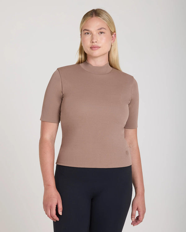 Taupe double layer high neck top in viscose, elegantly worn.