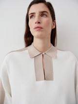 Contrast Collar Knit Polo Top in white, showcasing its elegant design with a structured collar and tonal viscose panels.
