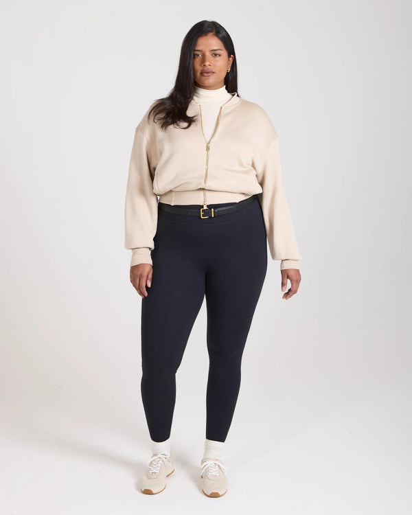 Mello Lyocell Fleece Zip-Through Jacket in Beige on model, showcasing relaxed fit and gold-finish zip.