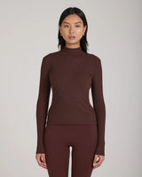 Emello chocolate brown Forma ribbed turtleneck top showcasing a high collar and slim silhouette.