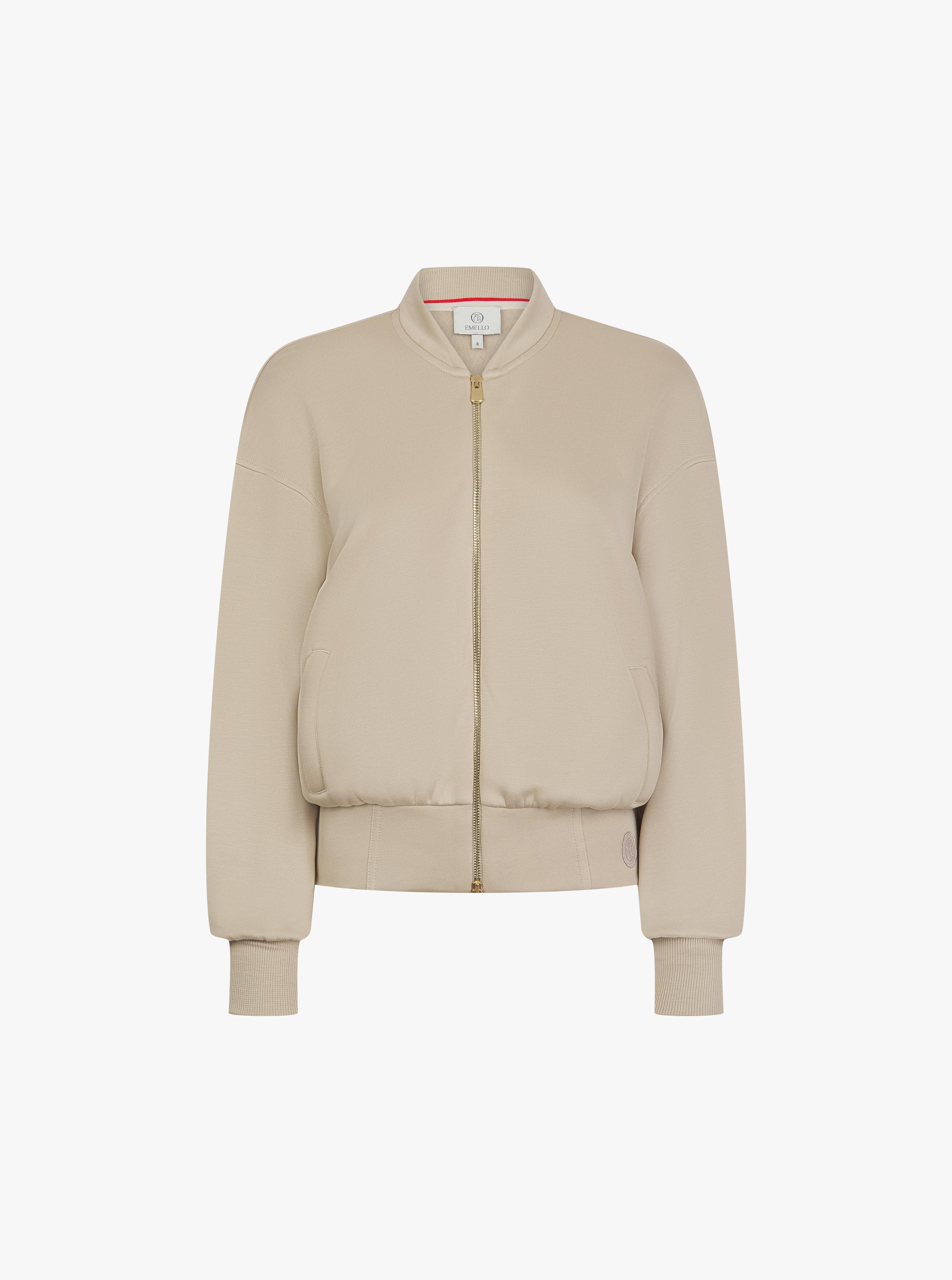 Beige zip-through jacket in buttery-soft lyocell fleece with gold hardware by Emello