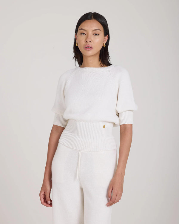 Cream puff sleeve sweater in merino wool and cashmere, featuring gold hardware.