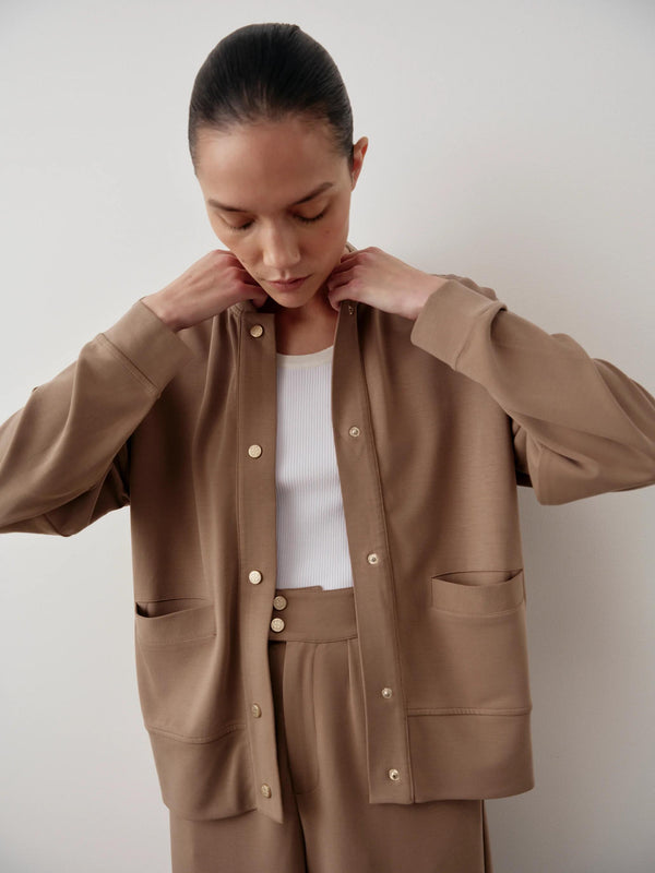Emello Modal Popper Jacket in warm brown with a collarless design and relaxed shoulders.