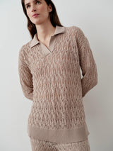 Emello Open Knit Polo Top in neutral beige showcasing fluid, textured fabric and longline silhouette.