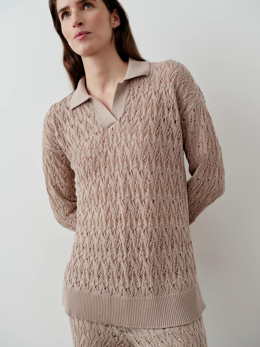 Emello Open Knit Polo Top in neutral beige showcasing fluid, textured fabric and longline silhouette.