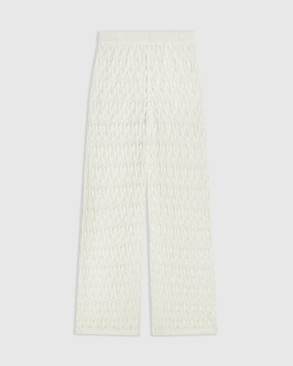Elegant cream open knit trousers in relaxed straight-leg silhouette, crafted from 100% Italian cotton.