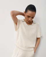 Emello Textured Knit Polo Top in white cotton, featuring crochet-effect detailing and relaxed fit.