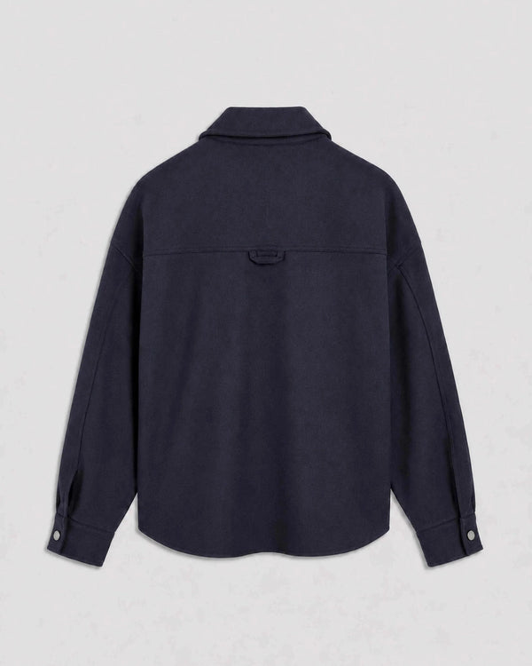 Back view of Emello's Oversized Wool Overshirt in deep navy, featuring a refined silhouette with a heritage-inspired back yoke.