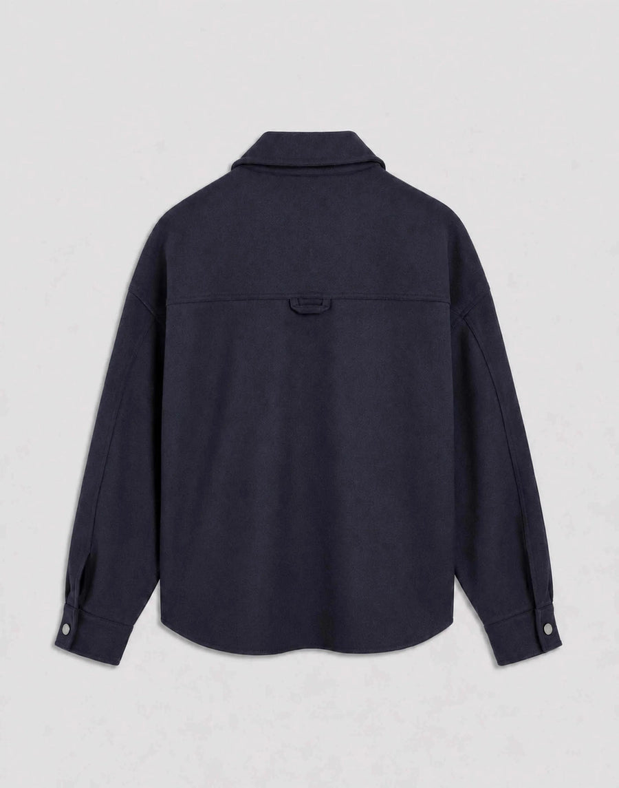 Back view of Emello's Oversized Wool Overshirt in deep navy, featuring a refined silhouette with a heritage-inspired back yoke.