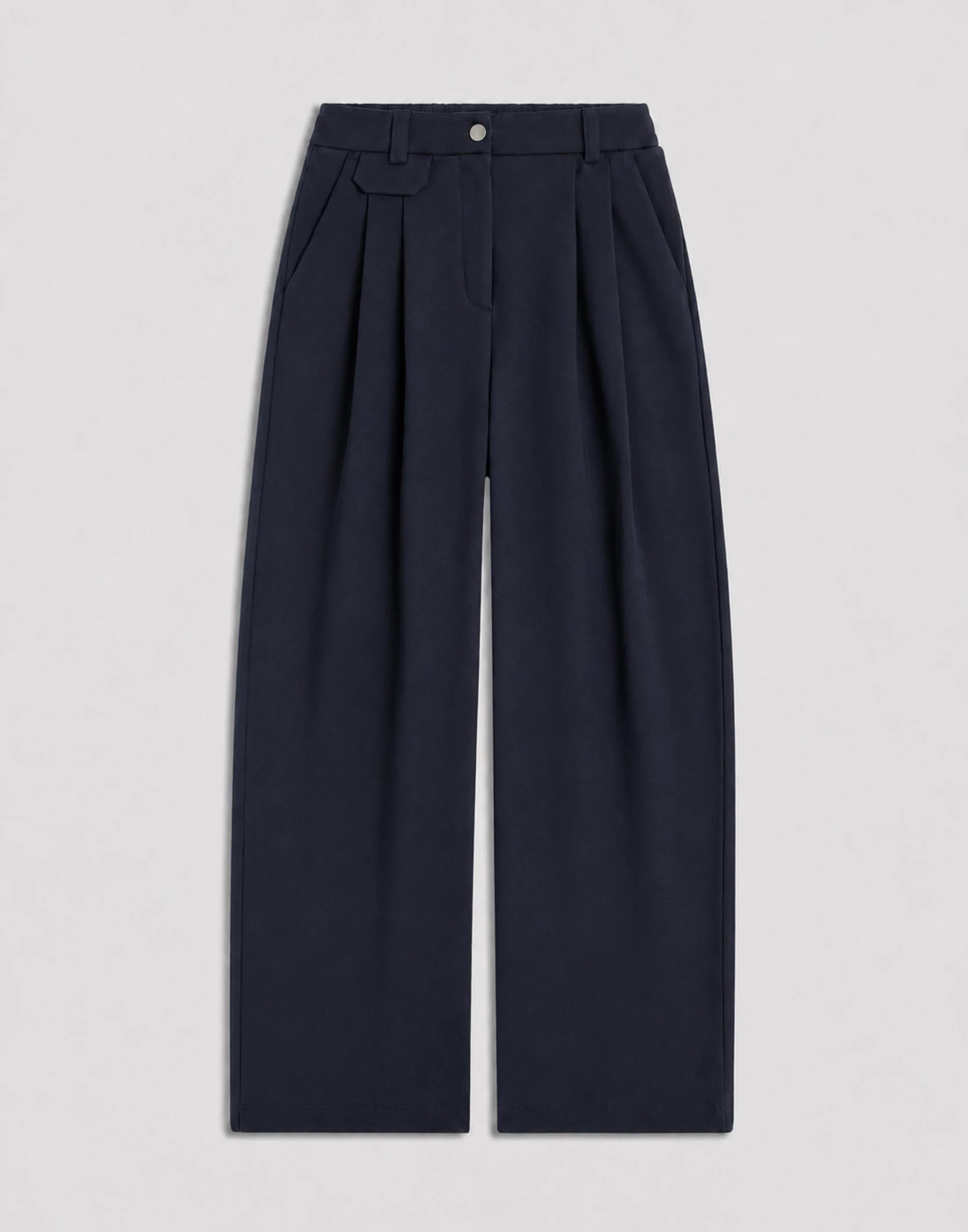 Pleated Wool Trousers in navy showcasing tailored wide-leg silhouette.