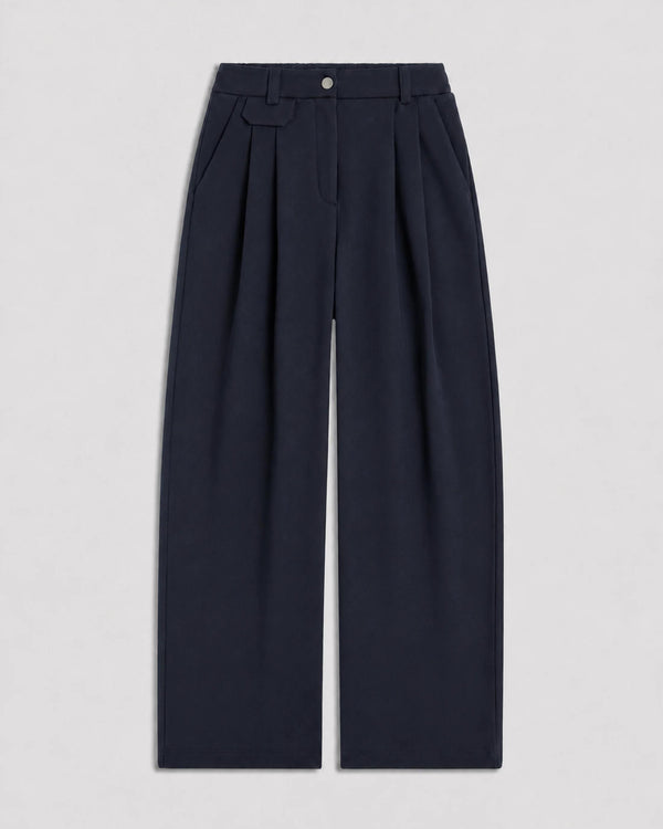 Pleated Wool Trousers in navy showcasing tailored wide-leg silhouette.