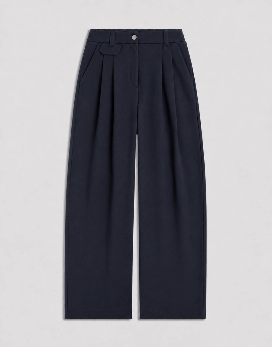 Pleated Wool Trousers in navy showcasing tailored wide-leg silhouette.