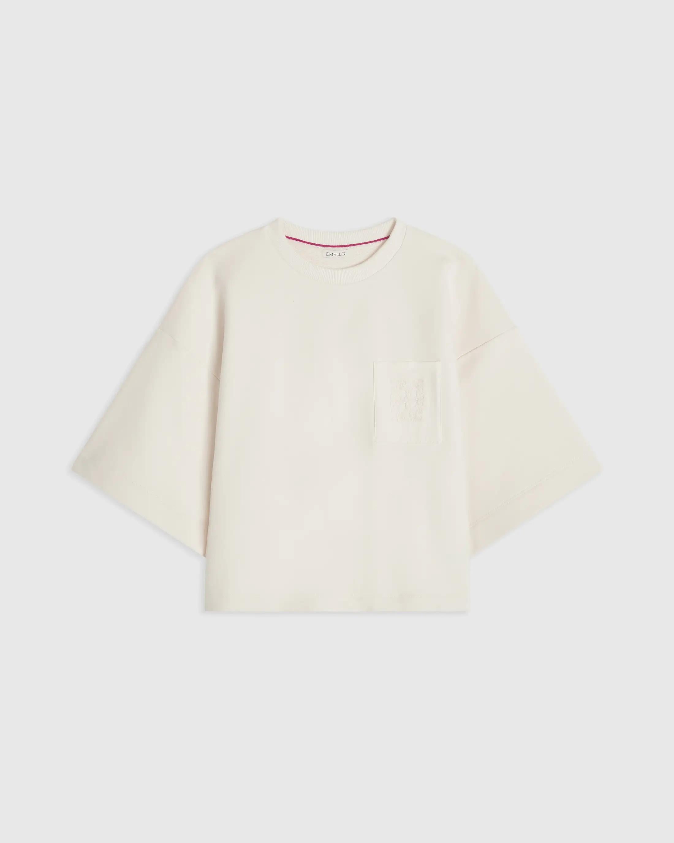 Emello Short Sleeve Pocket Sweatshirt in Cream with relaxed, boxy silhouette and twill chest pocket.