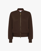 Front view of Emello's chocolate zip-through jacket in buttery-soft lyocell fleece with gold hardware.