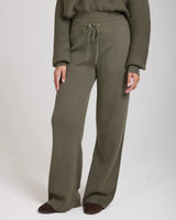 Emello Sorella Ribbed Knit Wide Leg Trousers in Olive, relaxed fit with a ribbed texture, featuring a drawcord waistband and gold accents.
