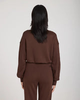 Back view of Emello's chocolate brown lyocell fleece sweatshirt featuring a relaxed fit and drop shoulder.