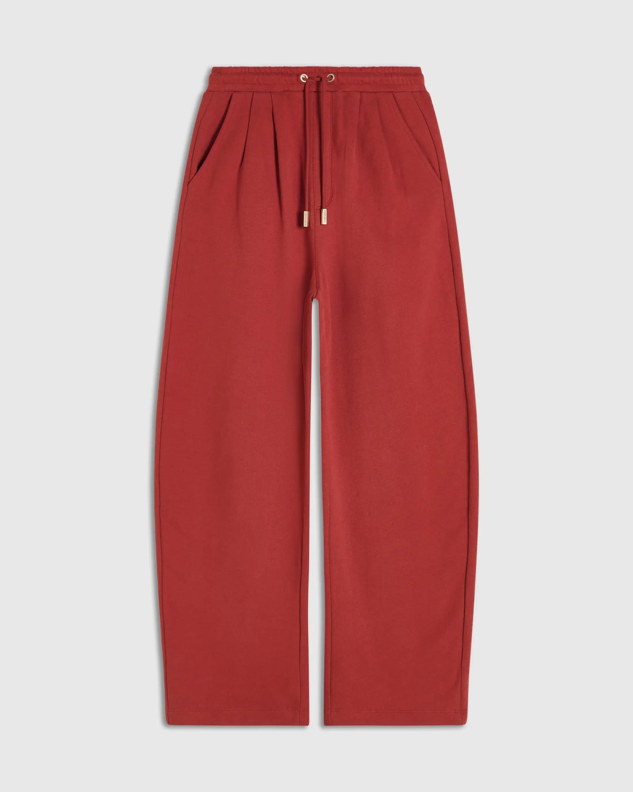 Emello Relaxed Straight Leg Trousers in Muted Rust Red with drawcord waistband and brushed-gold cord ends.