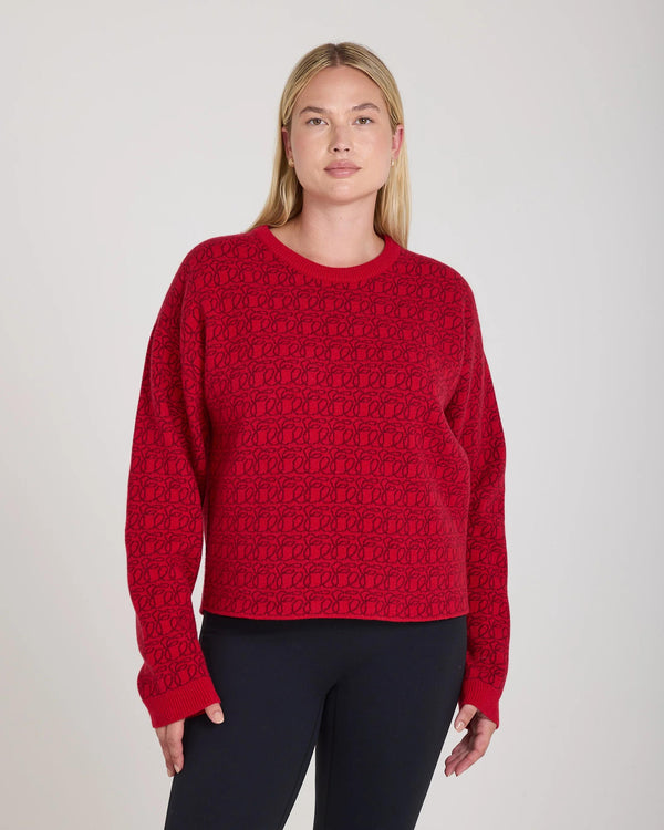 Reversible red jacquard cashmere sweater worn by model