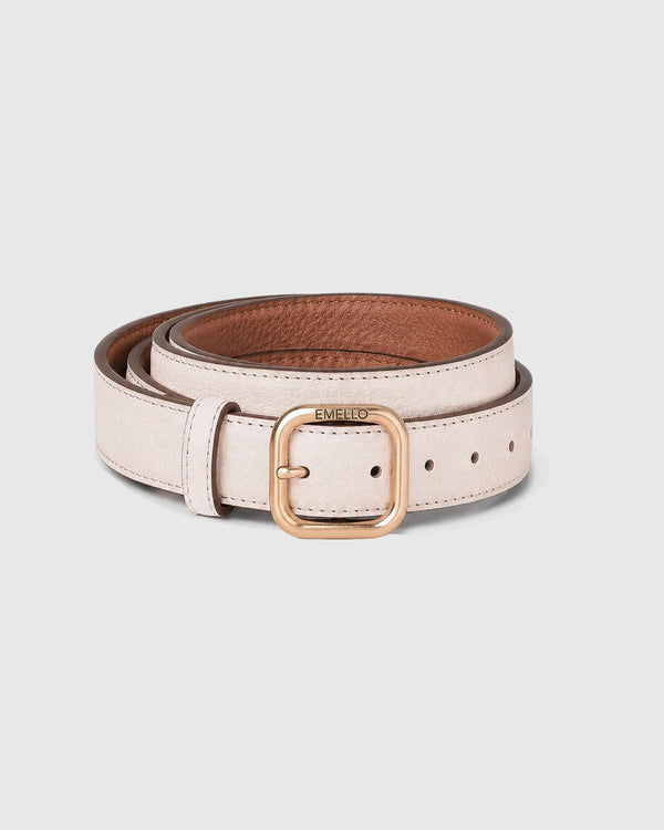 Reversible leather belt in tan and cream with a brushed gold-tone buckle, showcasing Emello's tactile elegance.