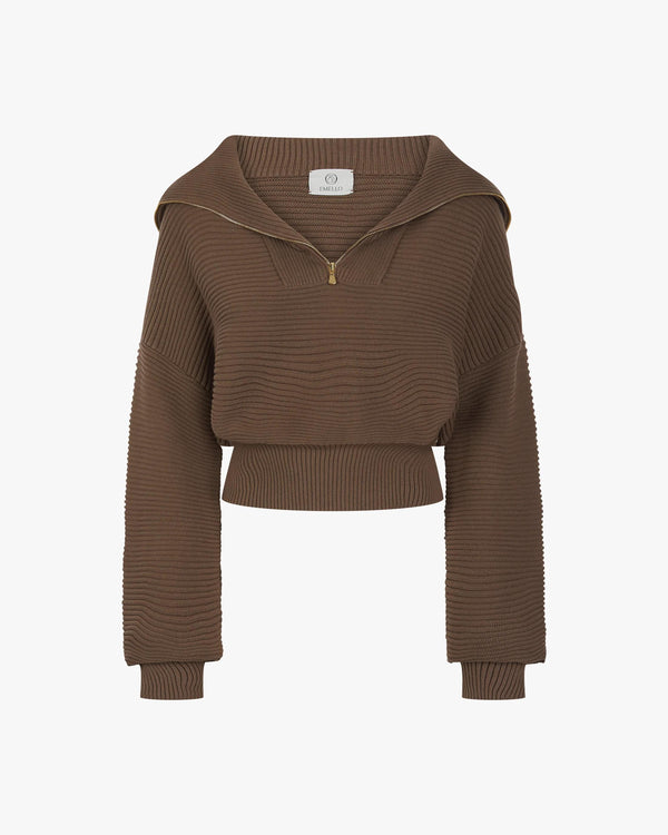 Taupe ribbed half-zip sweater in cotton-cashmere with gold hardware, featuring a funnel neck, relaxed fit and elegant ribbed texture.