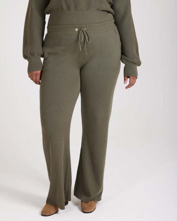 Olive ribbed knit wide-leg trousers with gold accent drawcord and relaxed fit.