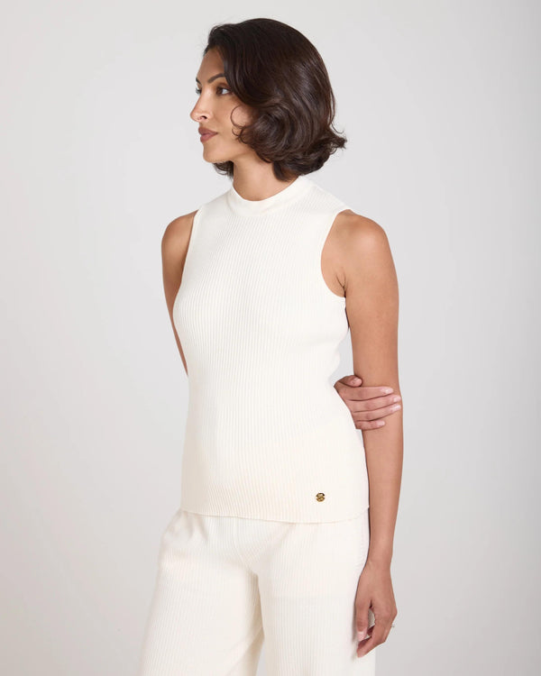 Sorella Ribbed Knit Vest in Cream, crafted from cotton-cashmere blend, worn by model with gold-finish detail.