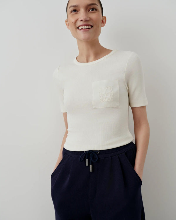 Emello Ribbed Pocket Tee in Cream featuring tonal chain-stitch embroidery